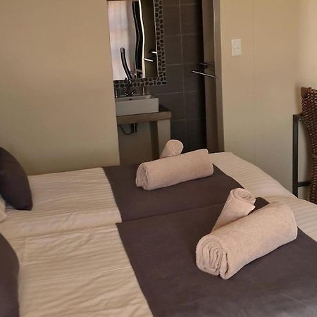 Opuwo Country Lodge Quarto foto
